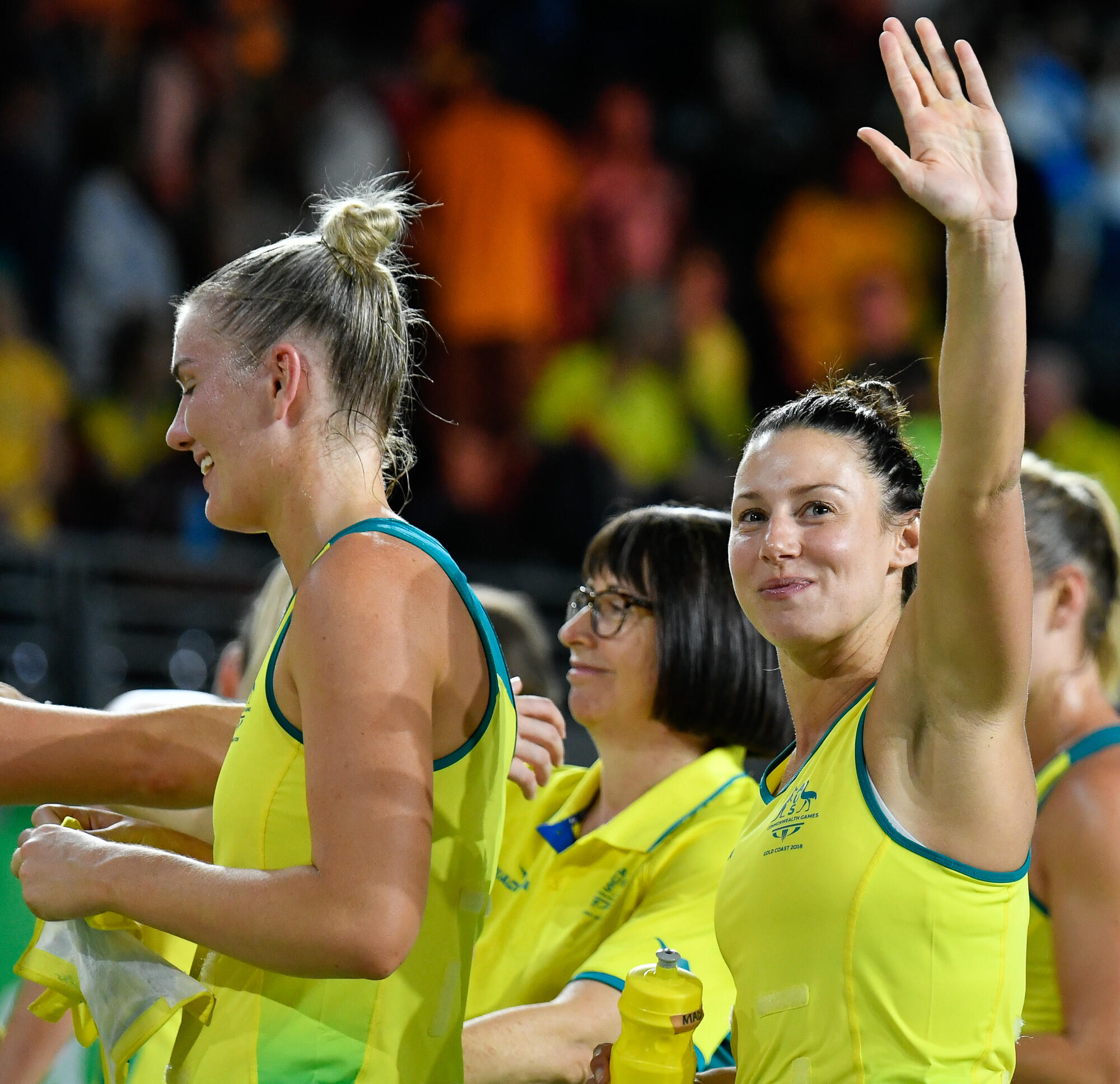 Madison Browne waving in Australian Diamonds Netball kit NetHub Founder, elite coach and player, Madi Browne, waving in Australian Diamonds colours after a match.
