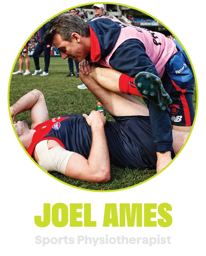 Joel Ames Sports, Netball & AFL physiotherapoist Joel Ames stretching an athlete on the sideline of a football match.