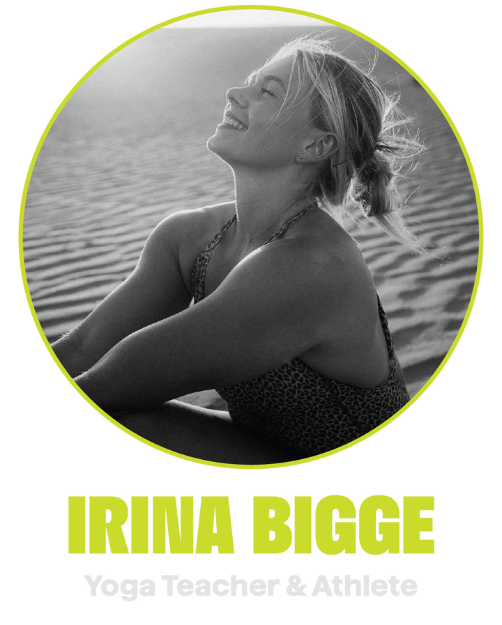 Irina Bigge Yoga teacher and athlete Irina Bigge smiling, seated on sand dunes.